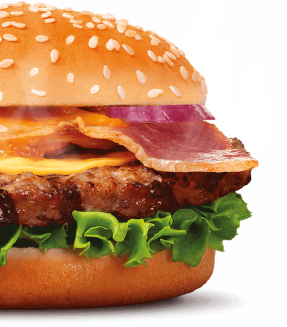 Juicy cheeseburger with crispy bacon, fresh lettuce, and red onion on a sesame seed bun, showcasing Virtual Dining Concepts' premium menu offerings.